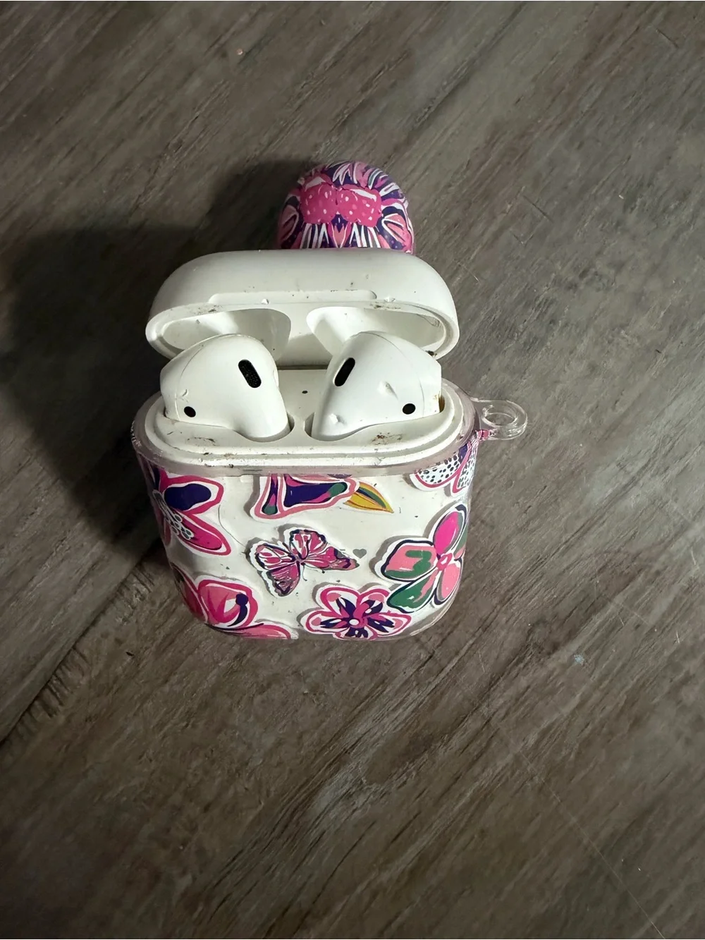 Apple Floral White and Pink AirPods and two Cases